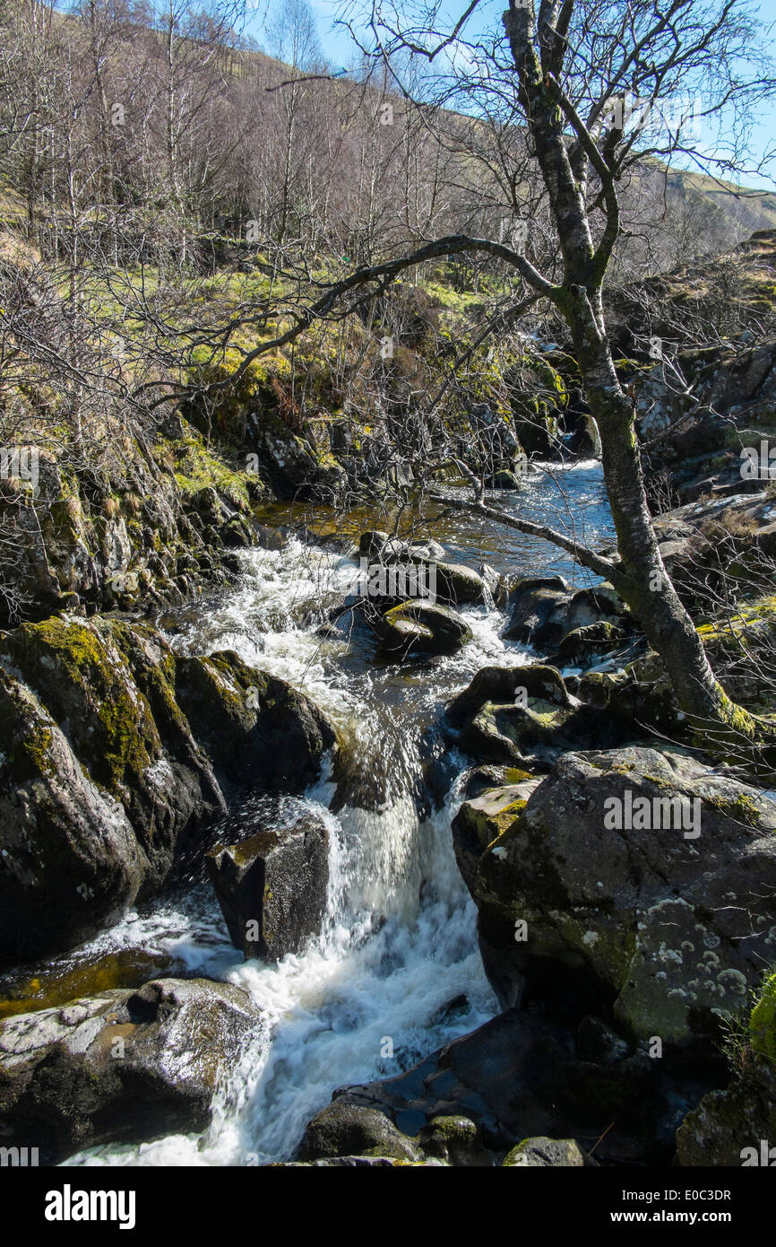 A waterfall in the hamlet of Watendlath in the English Lake District from Surprise View, Cumbria. Stock Photo