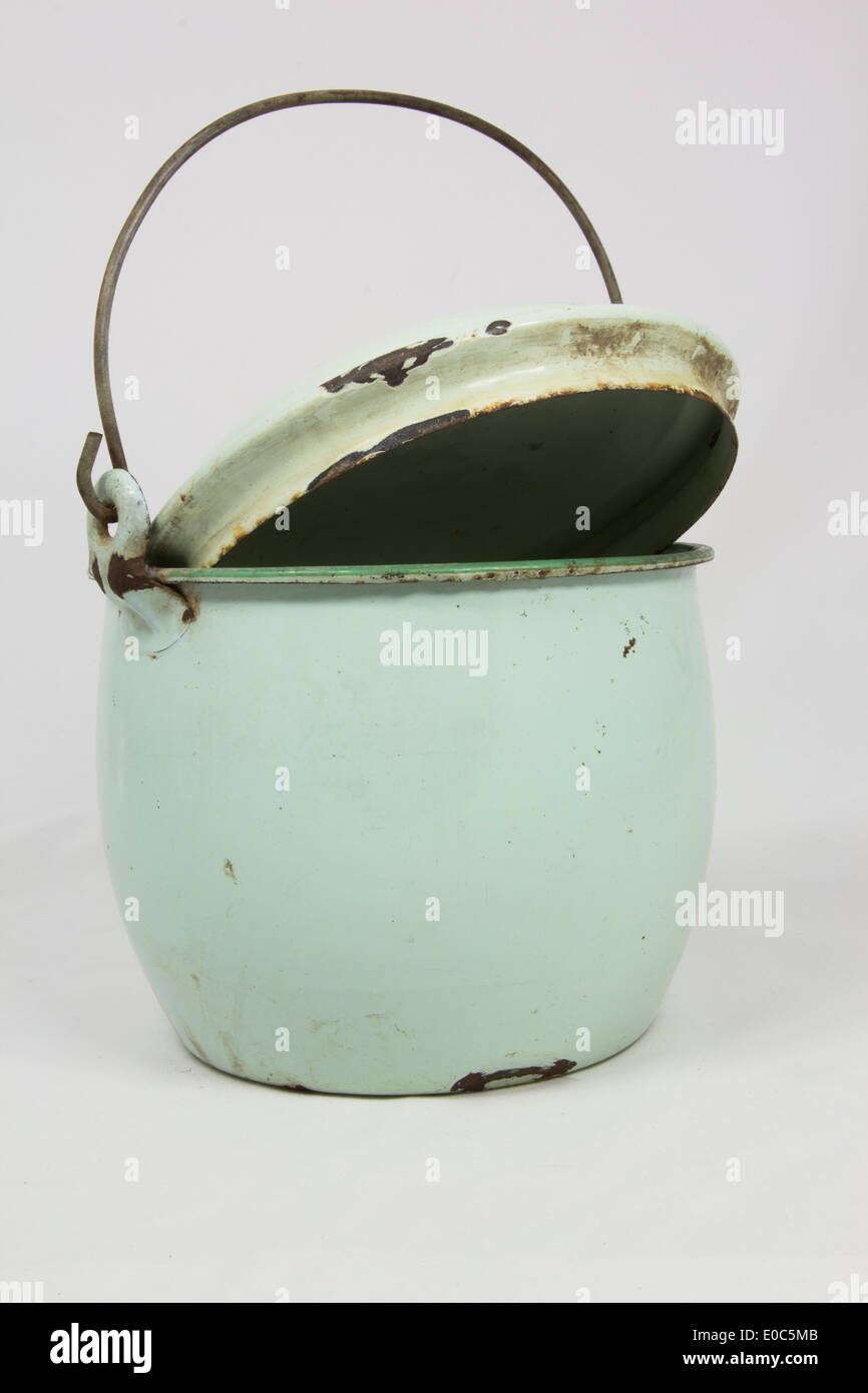 Vintage metal pot on white background Stock Photo