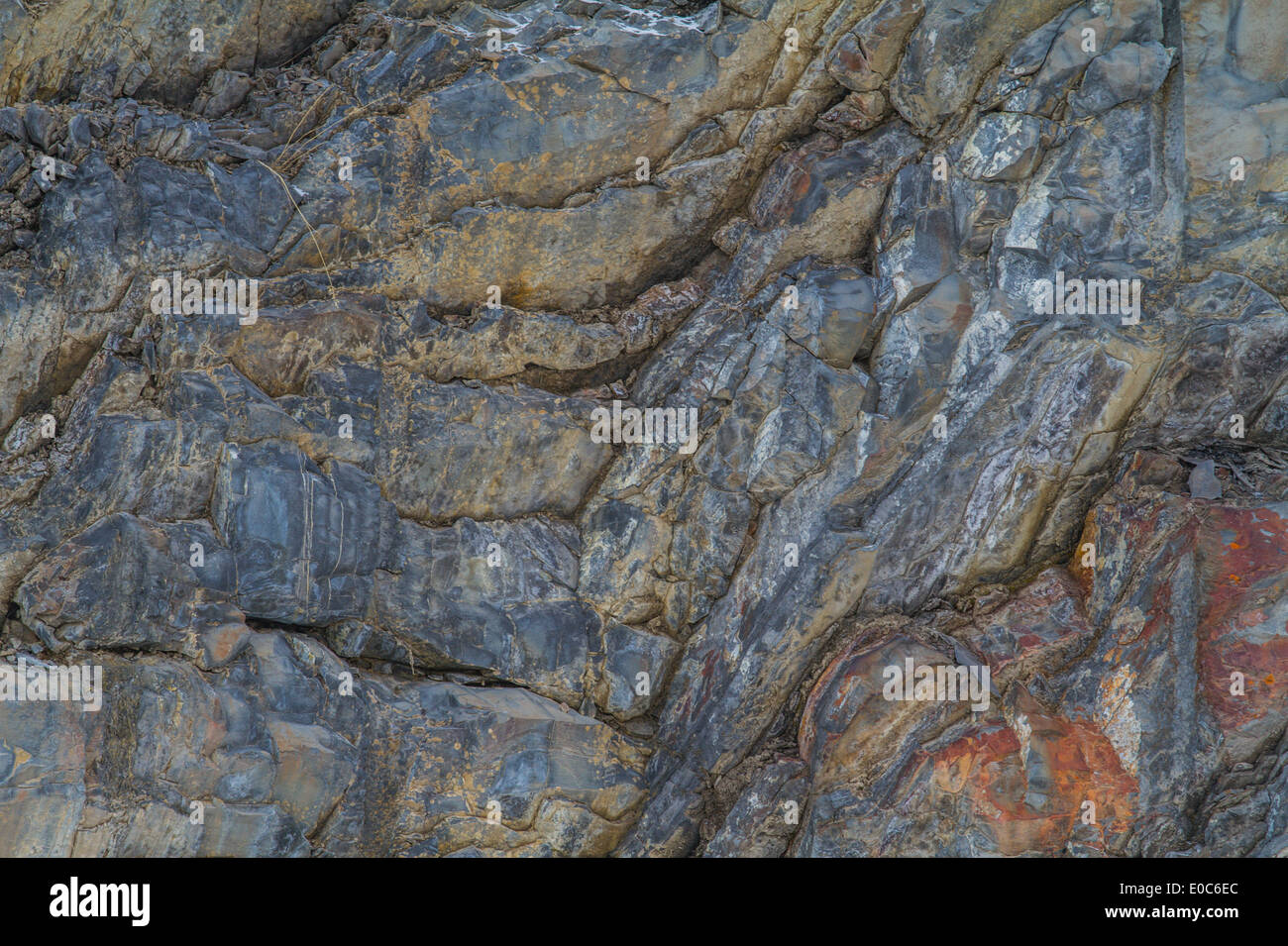 Rugged, textured, mountain rock face, full frame shot. Stock Photo