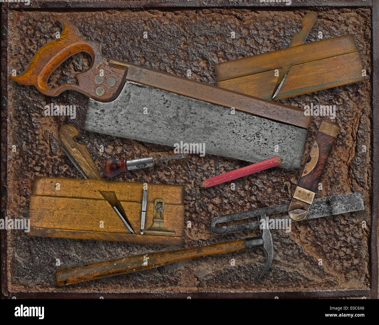 vintage woodworking tools over rusty industrial metal plate Stock Photo