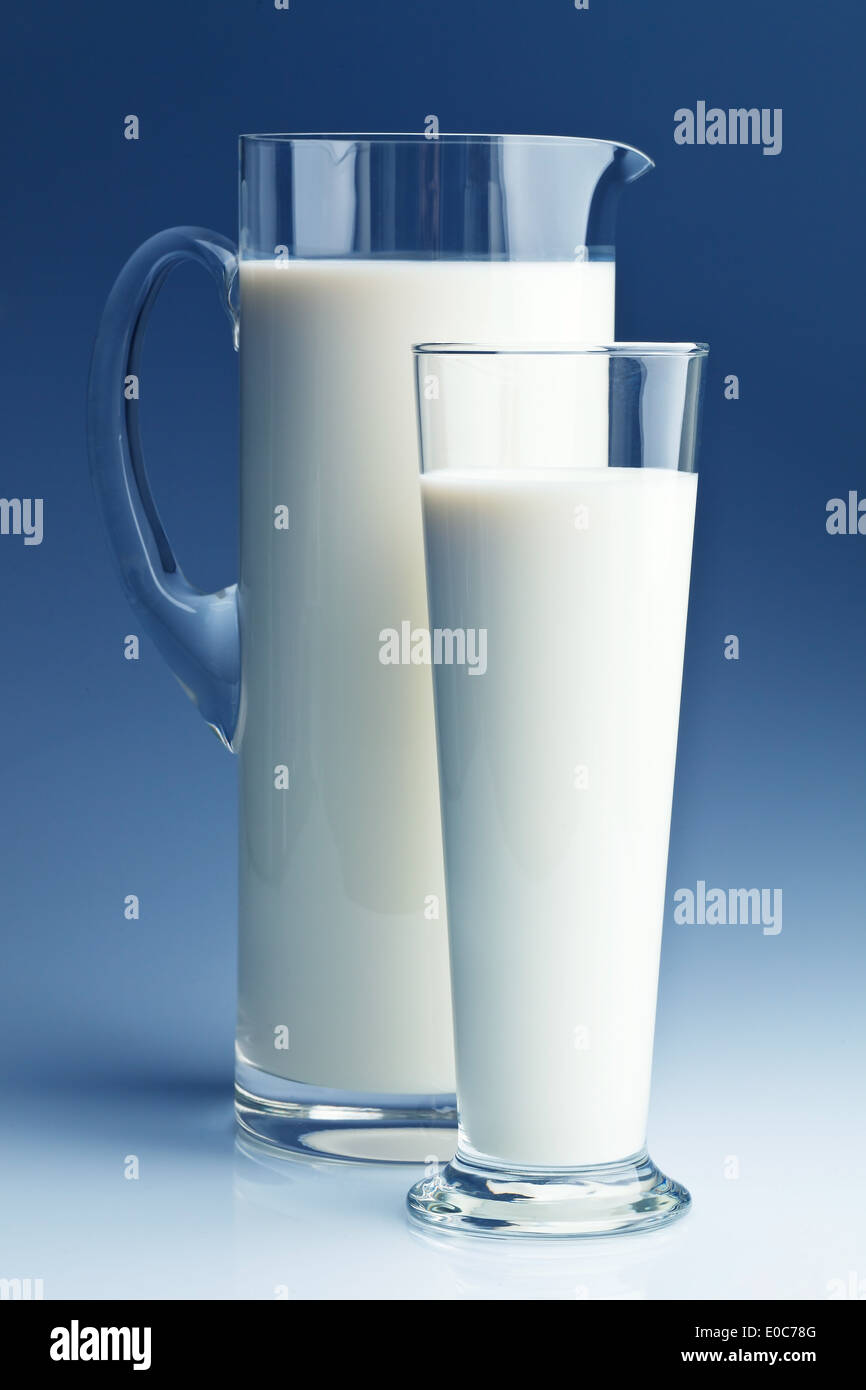 A jug with milk for healthy food and calcium., Ein Krug mit Milch fuer gesunde Ernaehrung und Calcium. Stock Photo