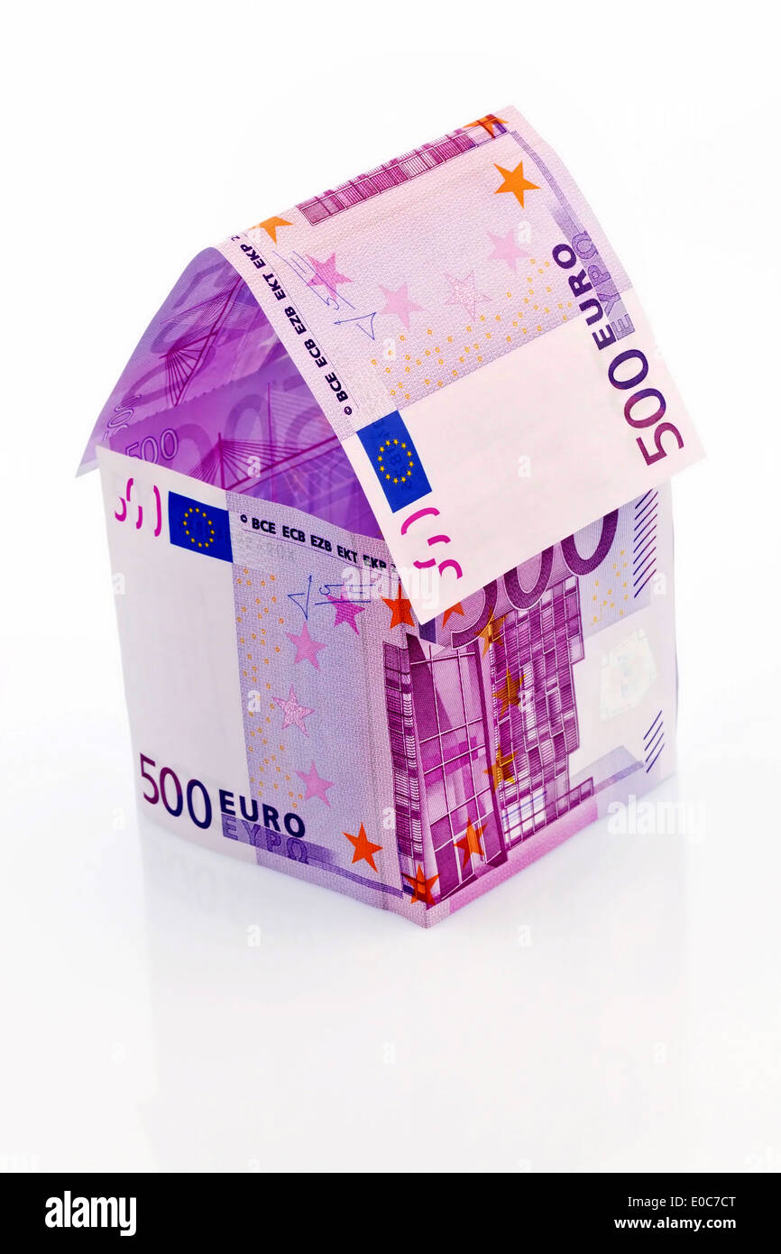 A house built from euromoney seem on white background. Construction saving, building of a house and house purchase., Ein Haus ge Stock Photo