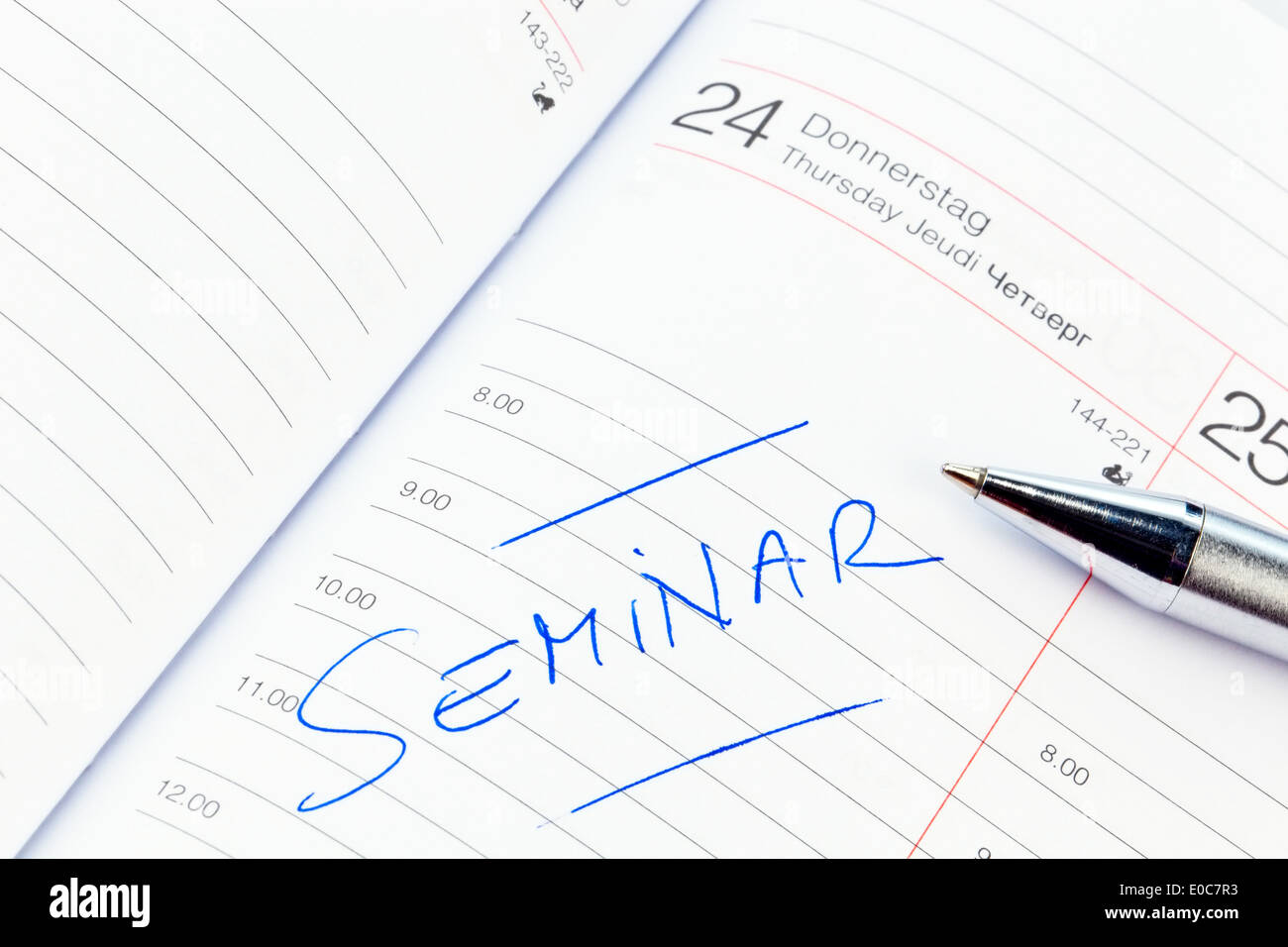 An appointment is put down in a calendar: Seminar, Ein Termin ist in einem Kalender eingetragen: Seminar Stock Photo