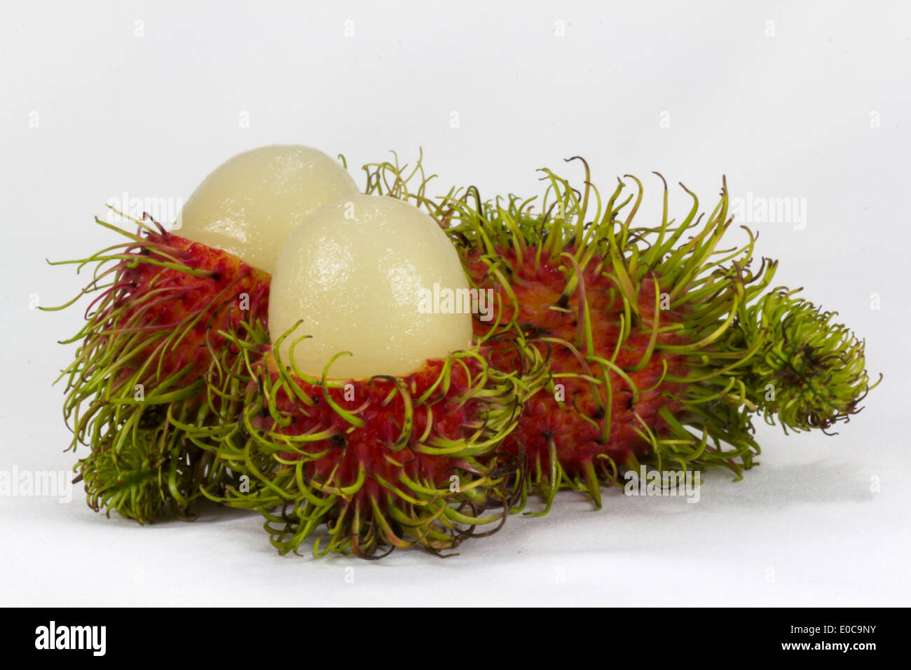 Rambutan on white background Stock Photo - Alamy
