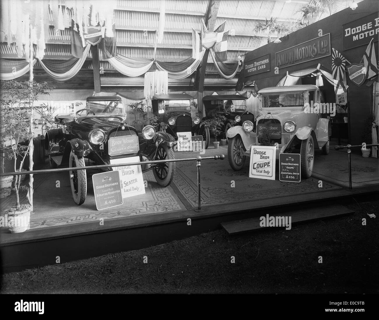 Amuri Motors showcased a display of Dodge Motor Cars around 1920, highlighting the automotive industry in New Zealand. The display includes vintage cars, such as the Dodge coupe, reflecting early 20th-century car culture and technology. Stock Photo