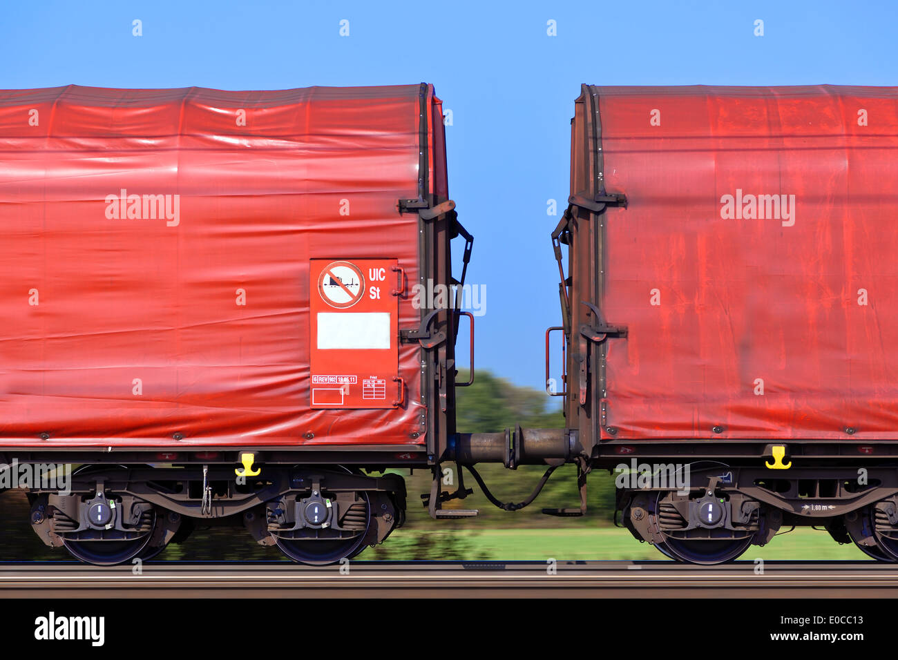 The carriages of a goods train on railway rails. Umweltrfreundlicher