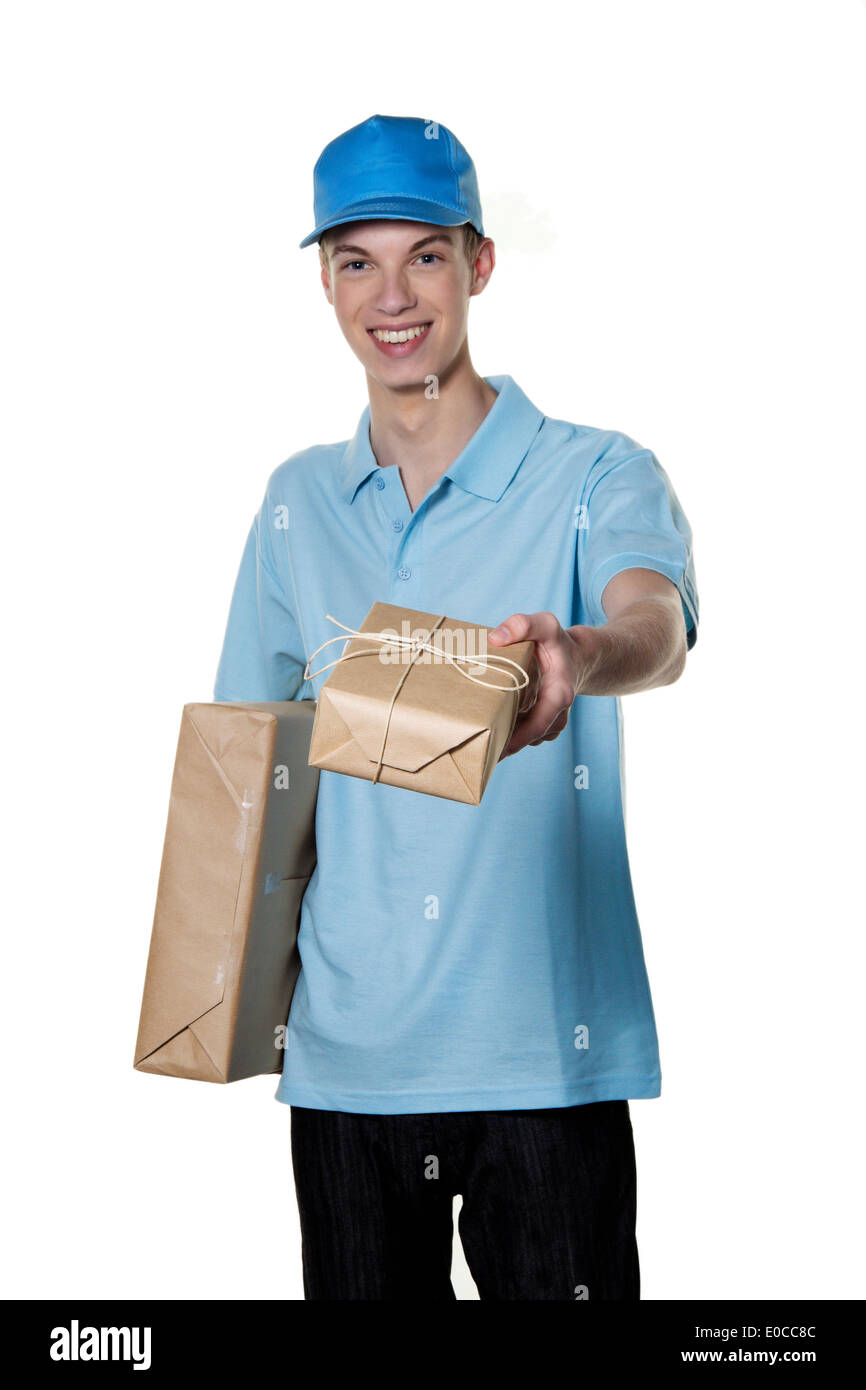 A young man of messenger service brings a package, Ein junger Mann von Botendienst bringt ein Paket Stock Photo
