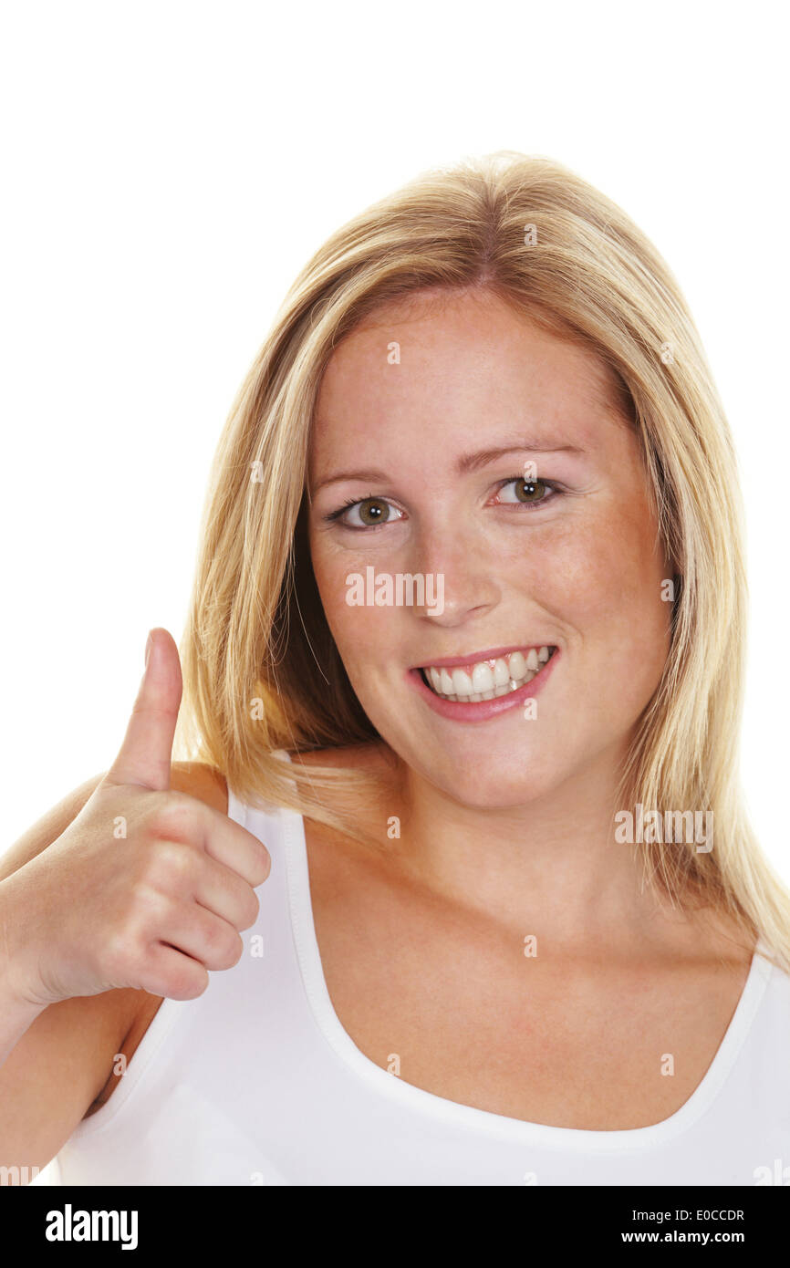 A young, successful woman keeps the fingers crossed upwards. Symbolic picture for success, more exempt to white background, Eine Stock Photo