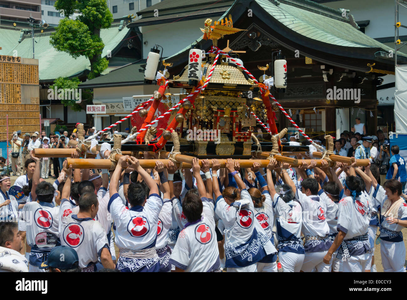 Parade carrying float celebrating Tenji Matsuri Festival, Osaka, Japan
