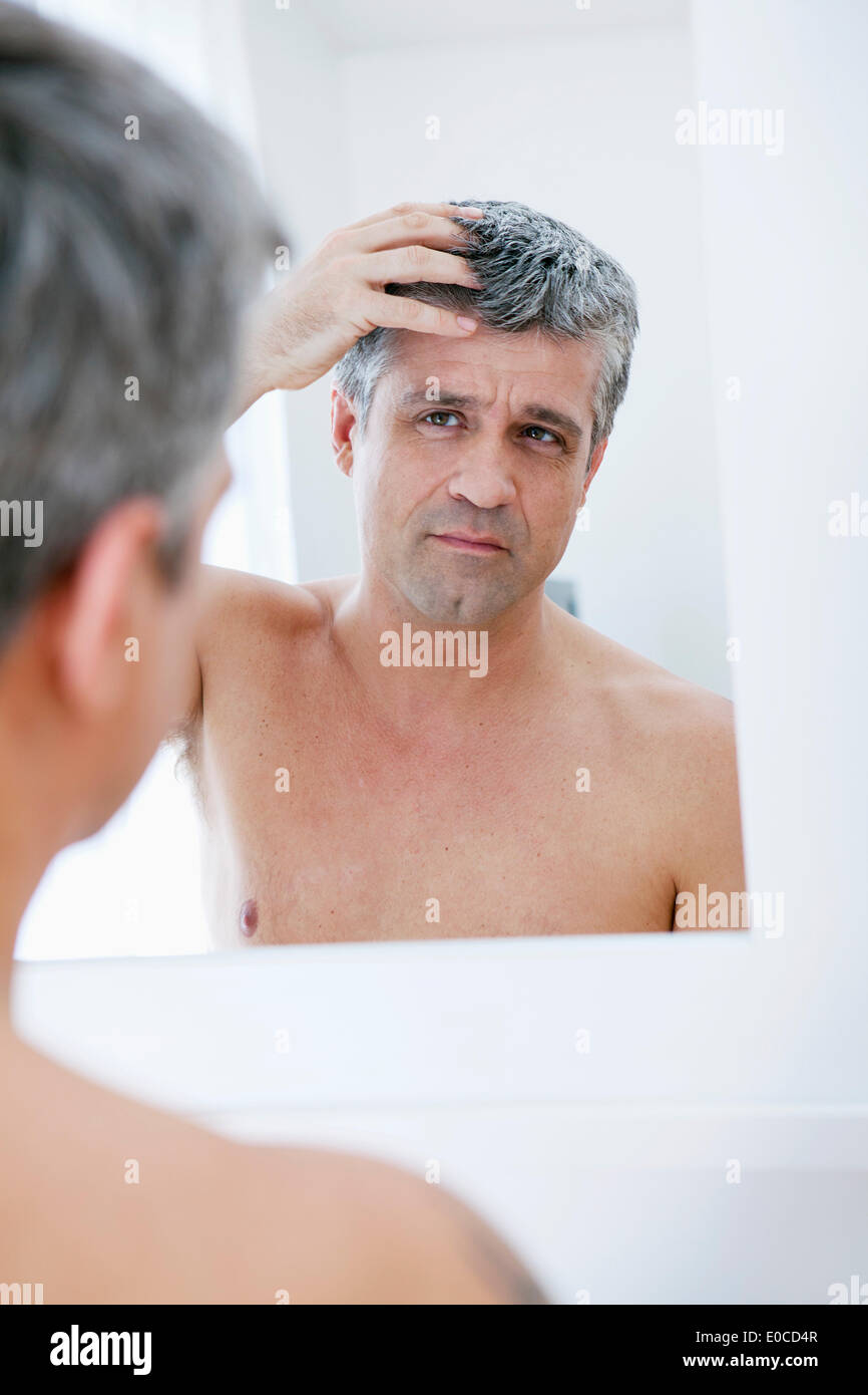 Man with mirror Stock Photo