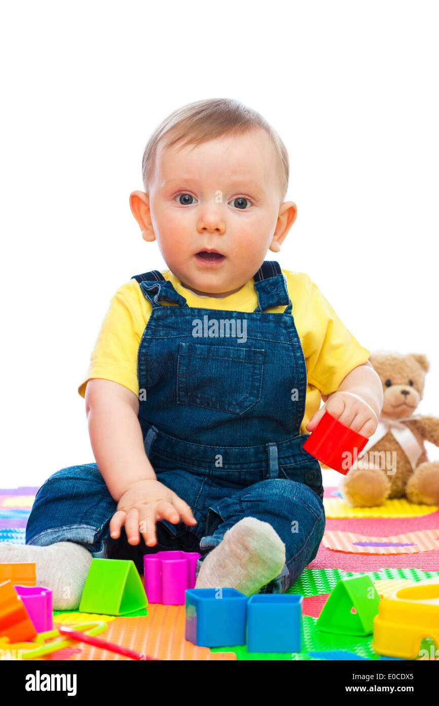 portrait of caucasian bay playing with toy Stock Photo