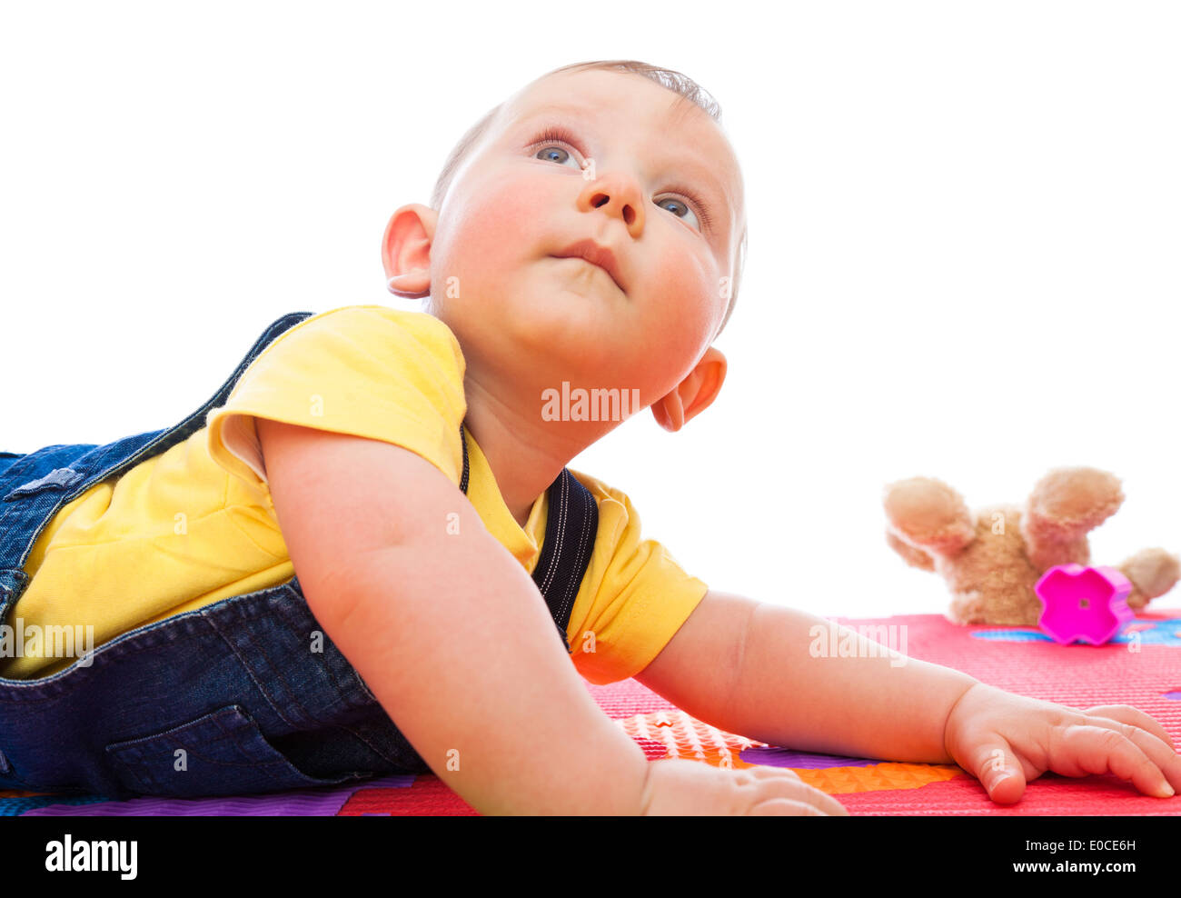 portrait of caucasian bay playing with toy Stock Photo