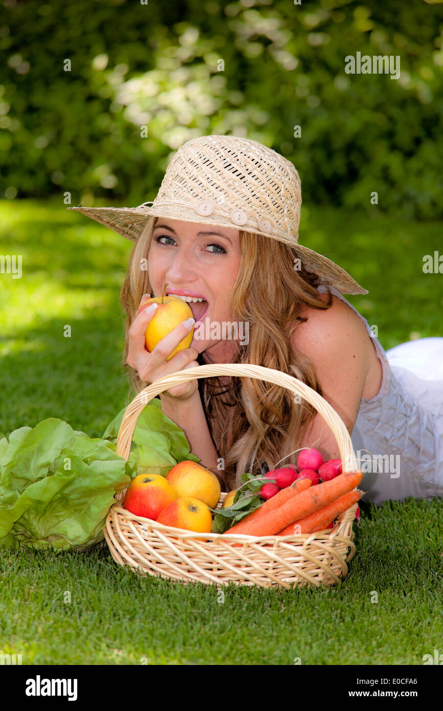 Fruit and vegetables in the basket with woman, Obst und Gemaeuese im Korb mit Frau Stock Photo