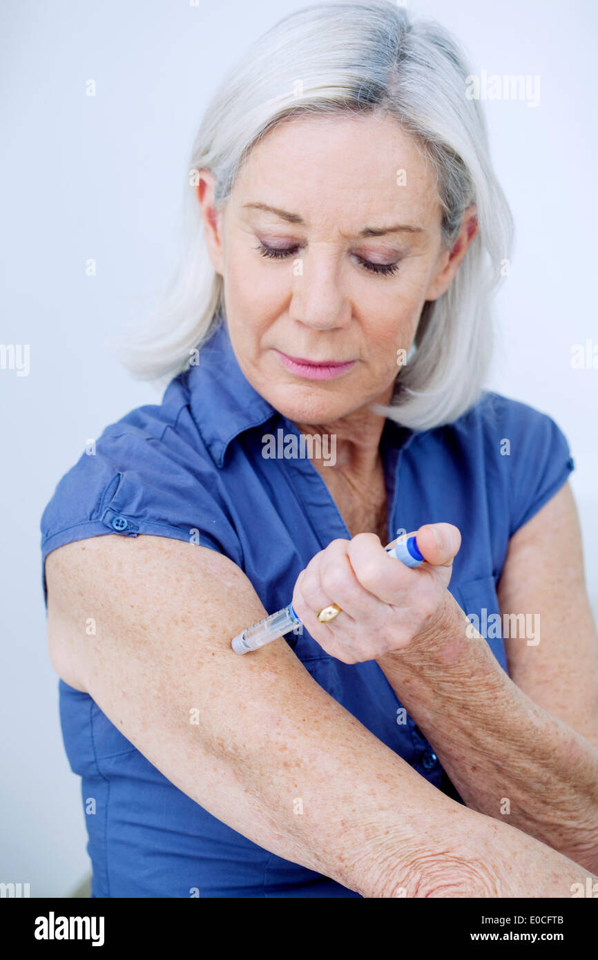 Treating diabetes in elderly person Stock Photo Alamy