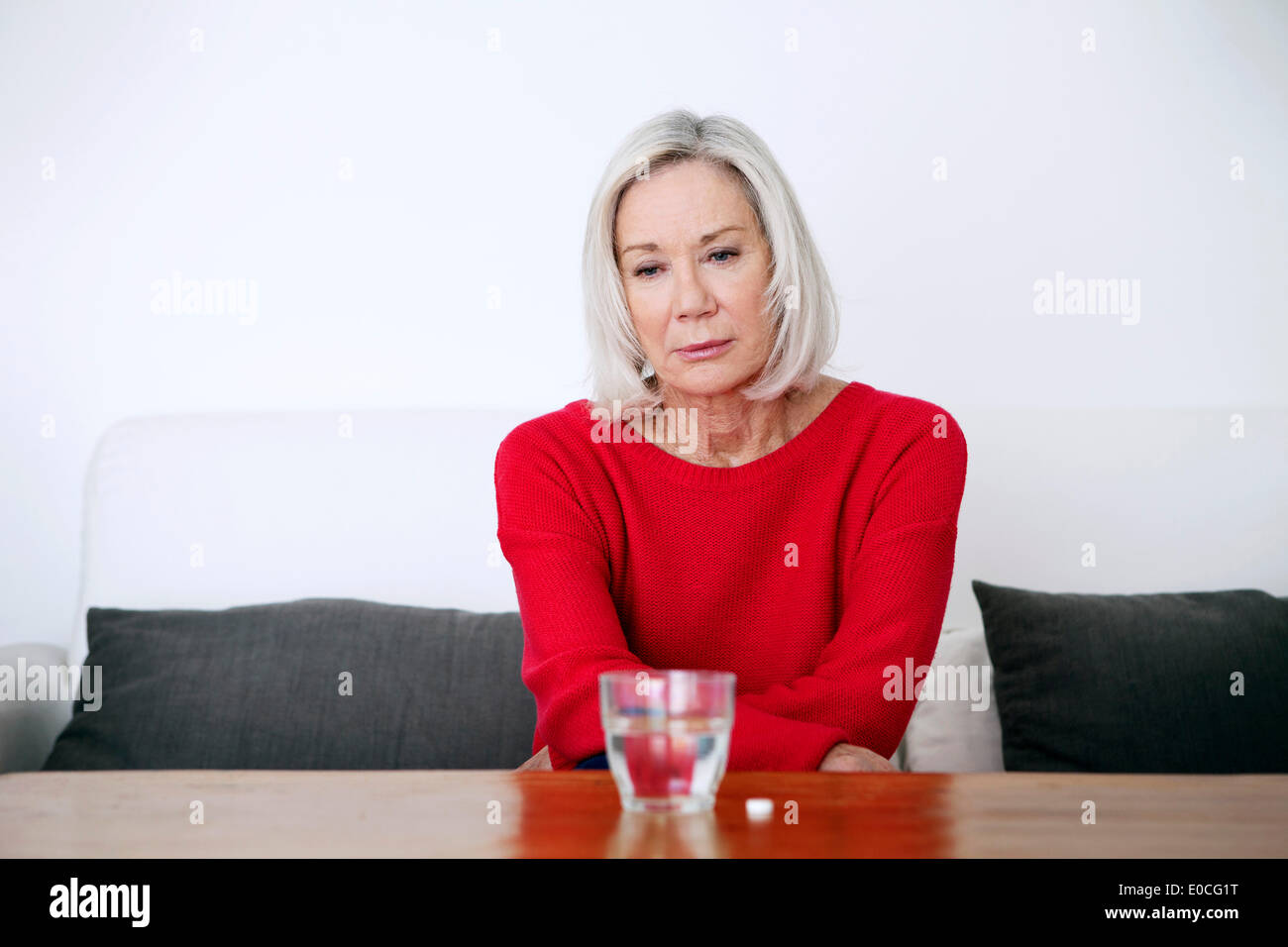 Elderly person with medication Stock Photo
