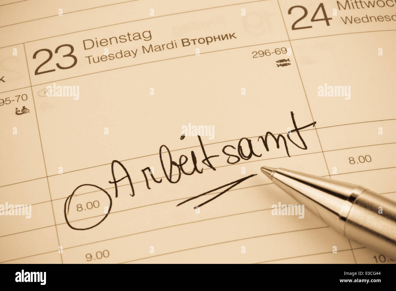 An appointment is put down in a calendar: Labour office, Ein Termin ist in einem Kalender eingetragen: Arbeitsamt Stock Photo
