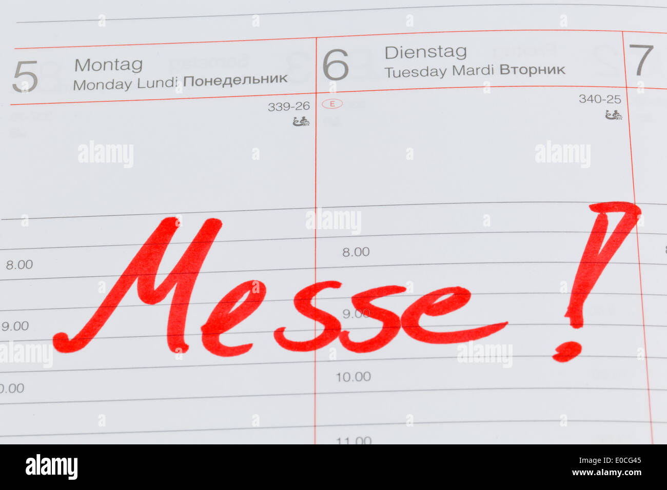 An appointment is put down in a calendar: Fair, Ein Termin ist in einem Kalender eingetragen: Messe Stock Photo