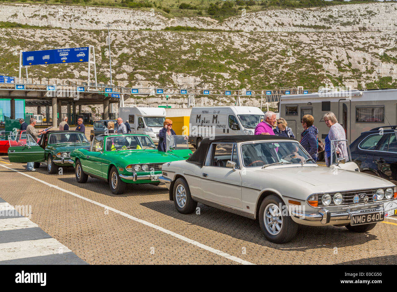 Triumph Stag cars waiting to board a ferry at Dover ferry terminal Stock Photo