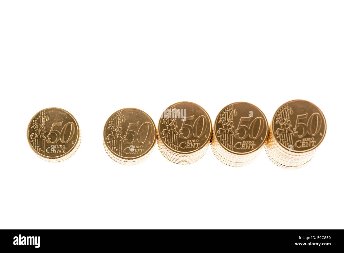 Some piles of euro of money coins on wei? ?? to em background, Einige Stapel von Euro Geld Maeuenzen auf weiﬂem Hintergrund Stock Photo