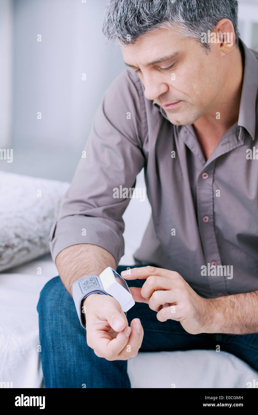 Blood pressure, man Stock Photo