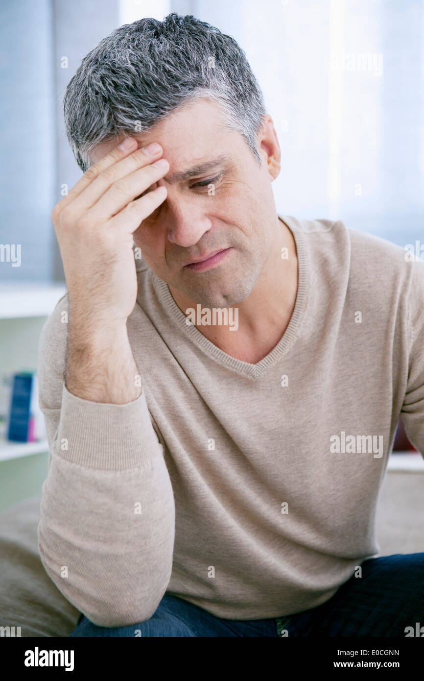 Man with a migraine Stock Photo