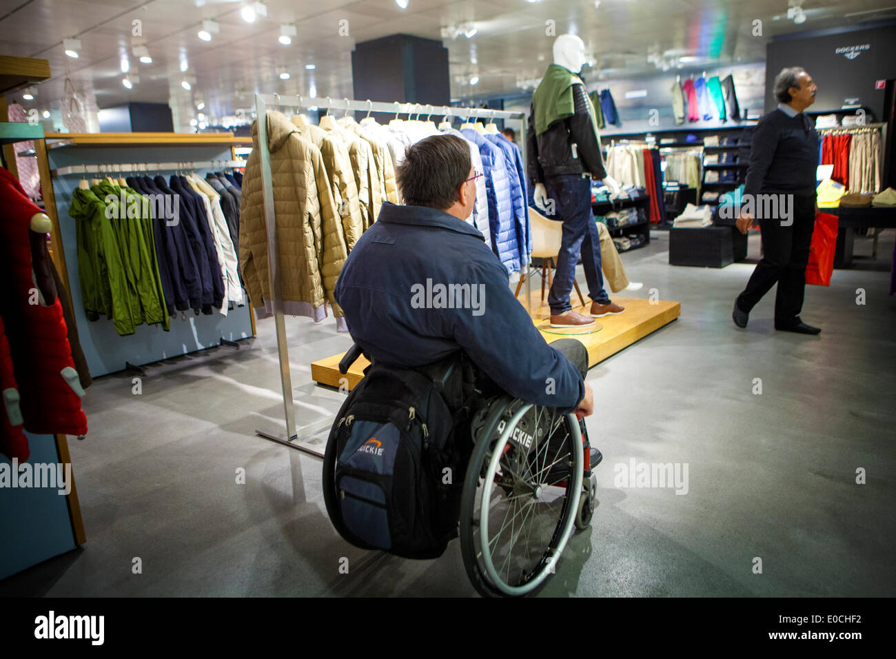 Disabled wheelchair shops shopping hires stock photography and images