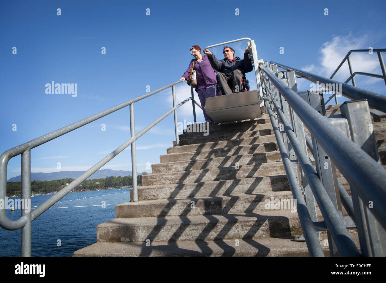 Old woman chair lift hi-res stock photography and images - Alamy