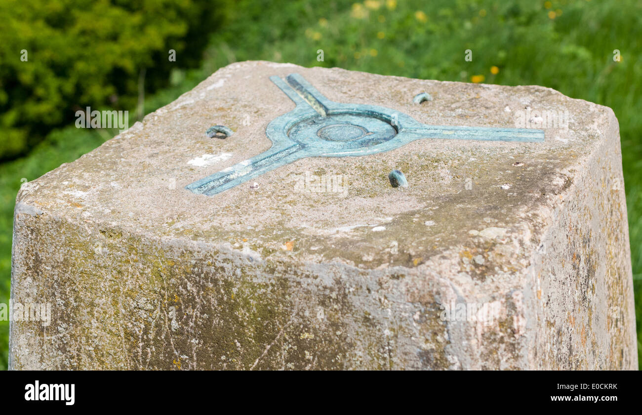 The top of a triangulation station or trig point on a hill top Stock Photo