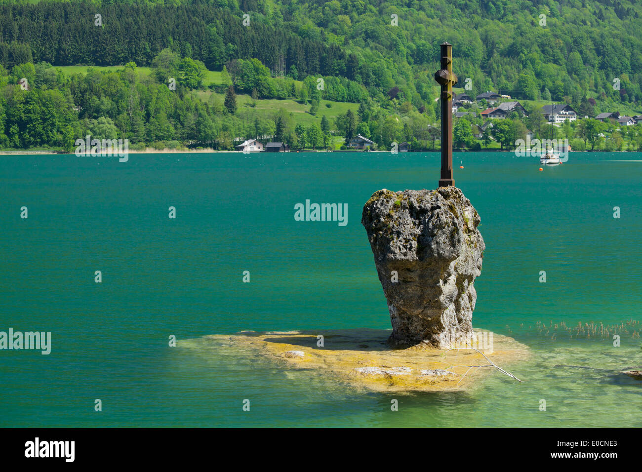 Kreuzstein, rock with cross at the banks of lake Mondsee, Upper Austria, Austria, Europe Stock Photo