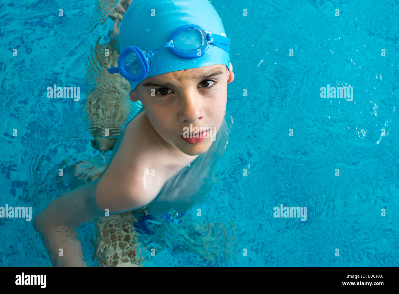 Little boy in swimming pool. Blue swimming pool Stock Photo Alamy