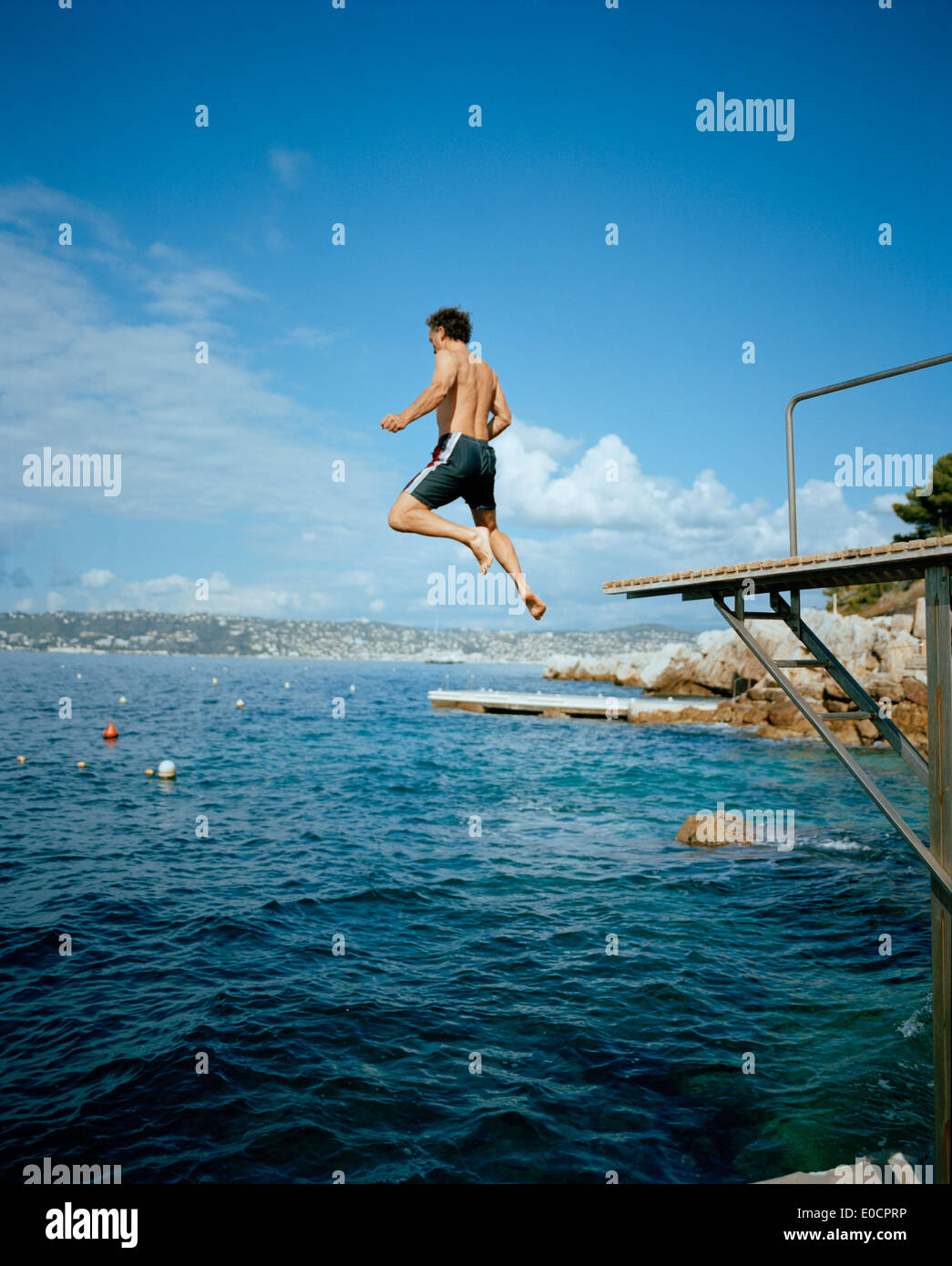 Man jumping into the sea, area of Hotel du Cap-Eden-Roc Boulevard JF  Kennedy, BP 29, 06601 Antibes Cedex, Cote d'Azur, France, E Stock Photo -  Alamy
