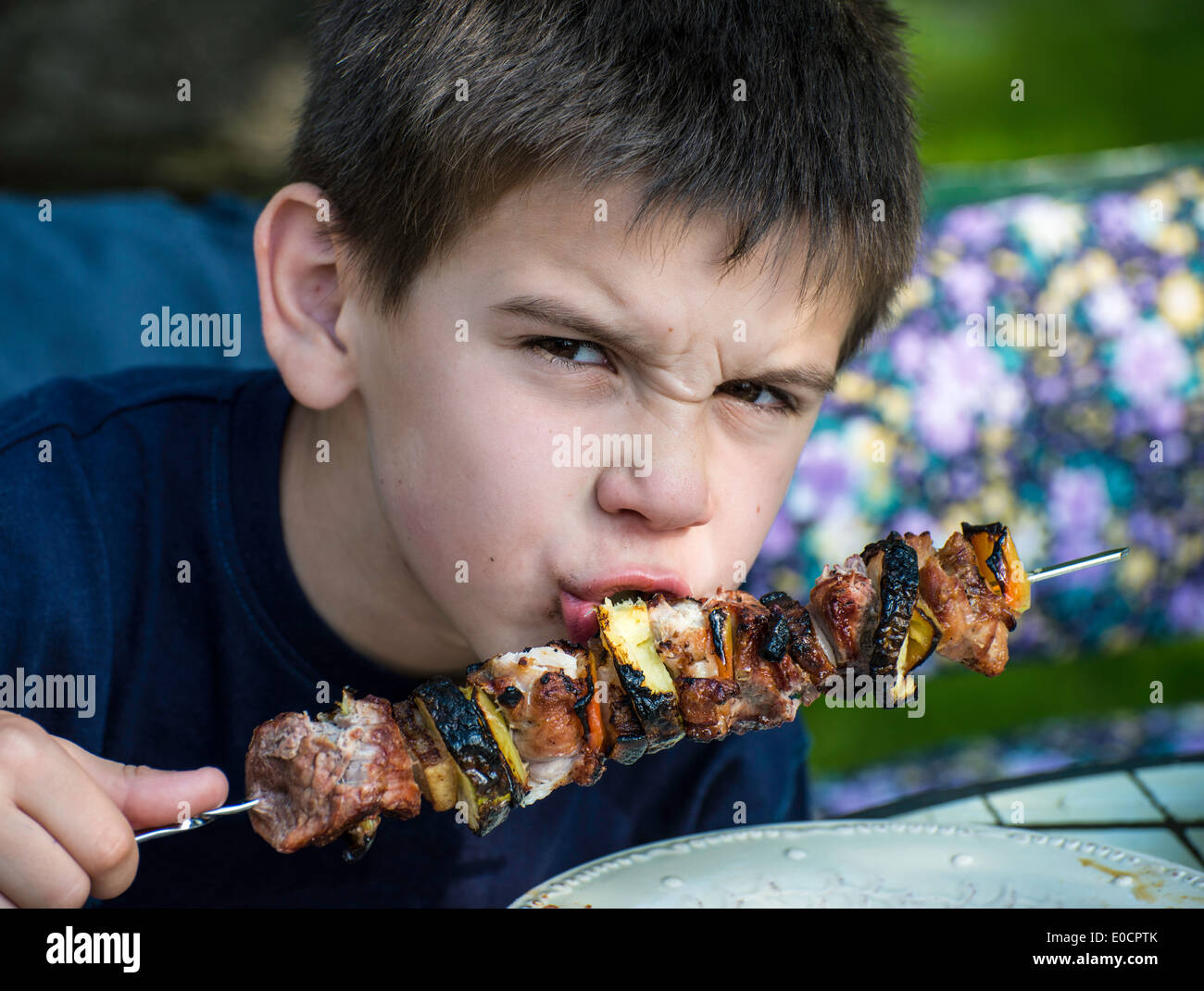 Child eating meat on a skewer. Barbecue meat Stock Photo 69122835 Alamy