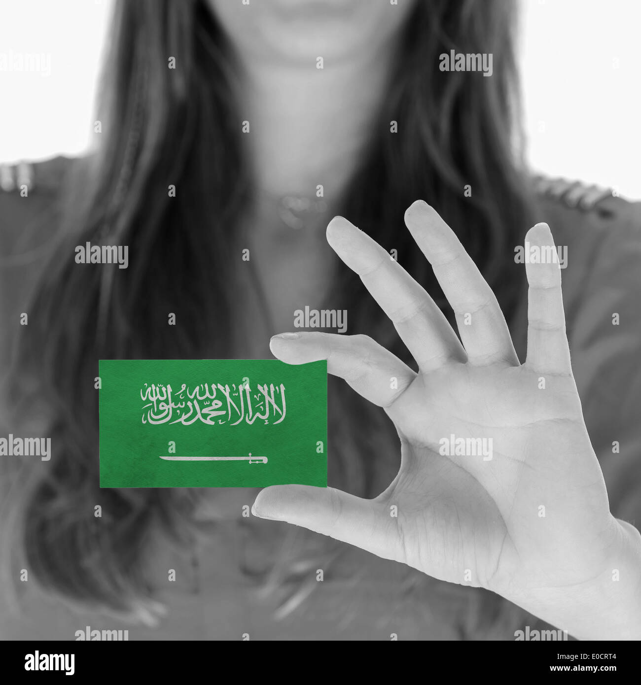 Woman in showing a business card Saudi Arabia Stock Photo - Alamy