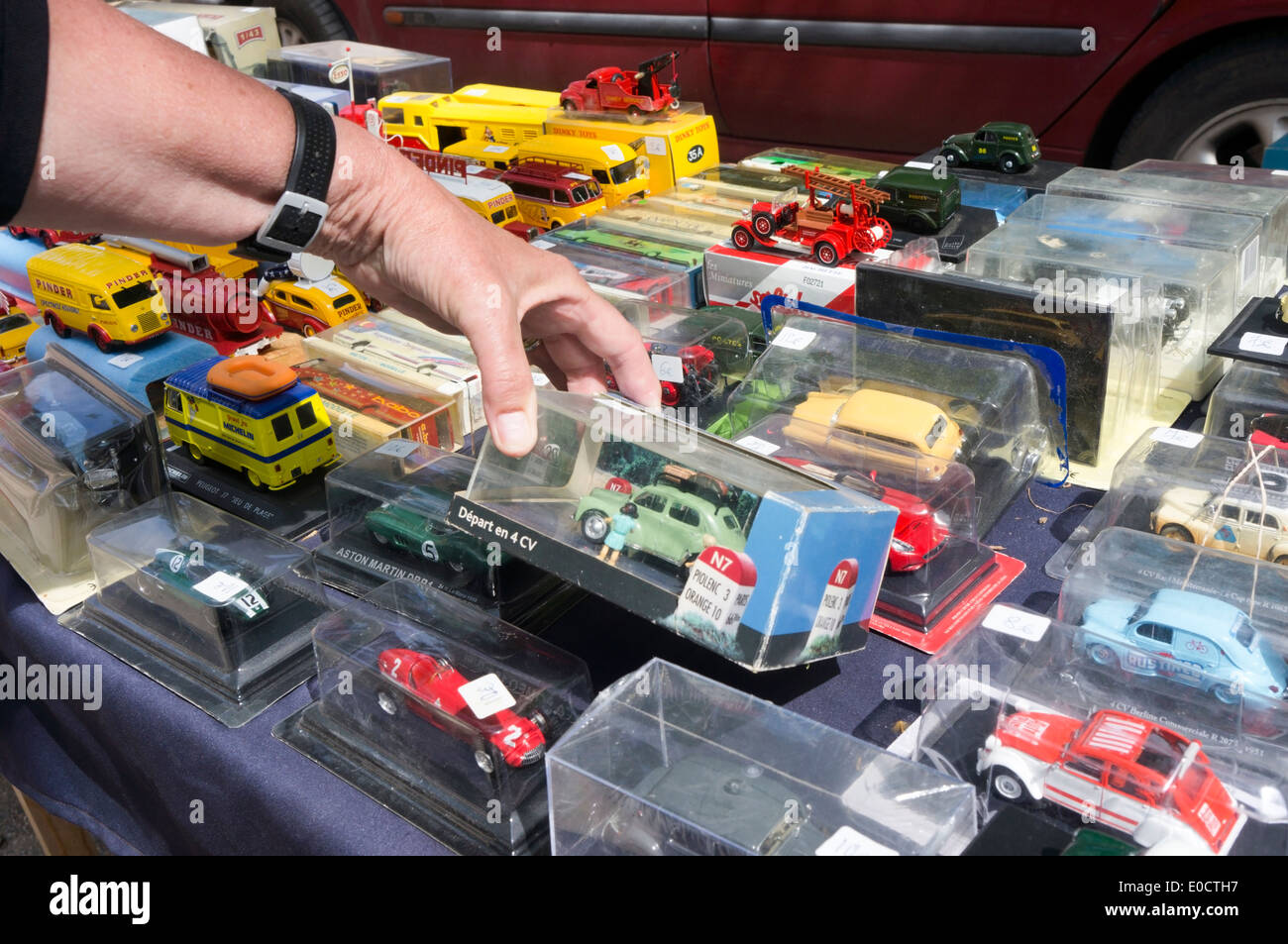 Model toy cars for sale on a market at Marseillan in Languedoc, south of France. Stock Photo