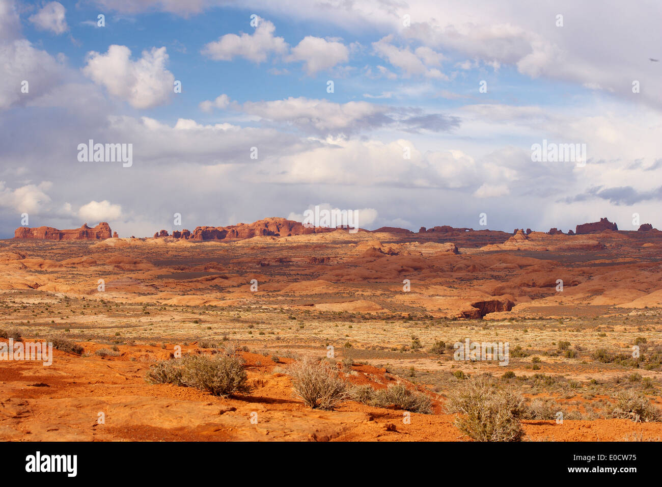 View from Park Avenue Viewpoint over the Petrified Dunes towards Balanced Rock and Windows Section, Arches National Park, Utah, Stock Photo