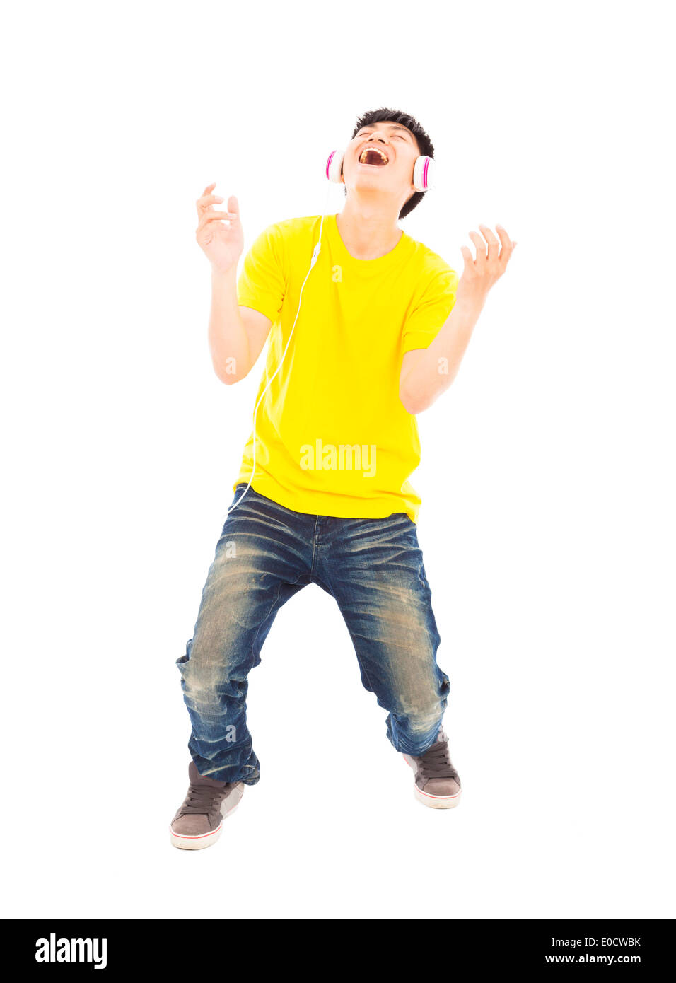 young man listening music and yelling out Stock Photo