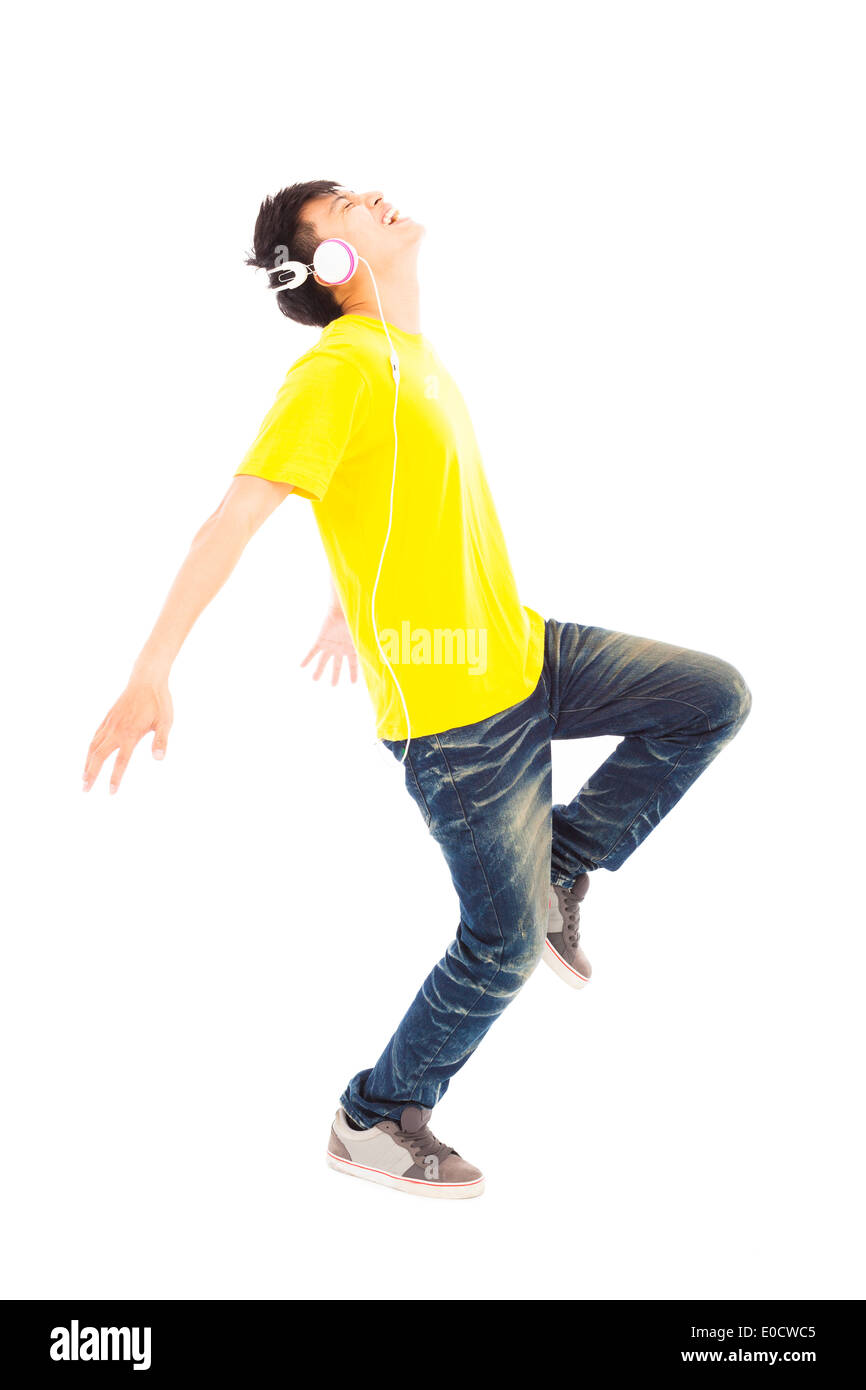 happy man dancing while listening music Stock Photo