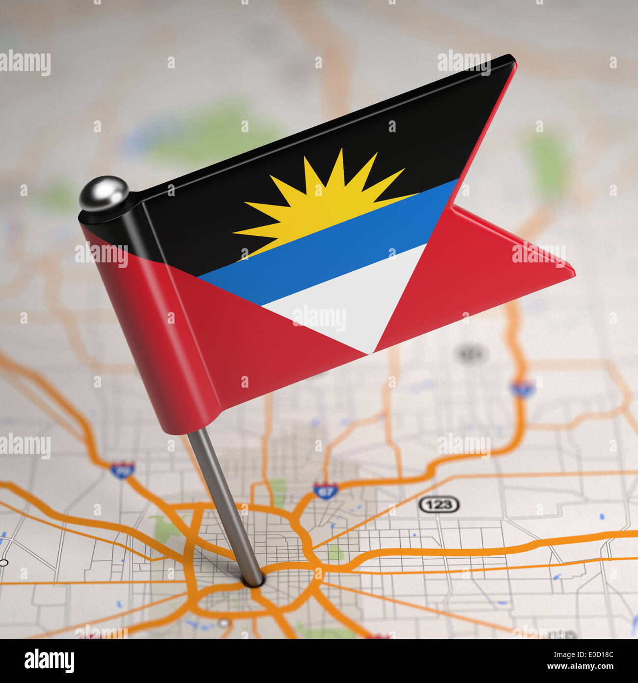 Antigua and Barbuda Small Flag on a Map Background. Stock Photo