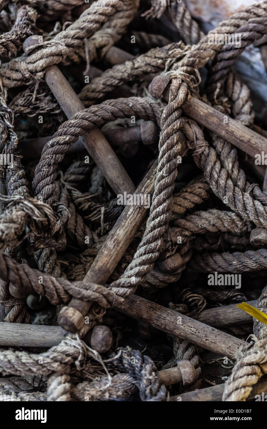 close up shot of an old and worn rope ladder Stock Photo