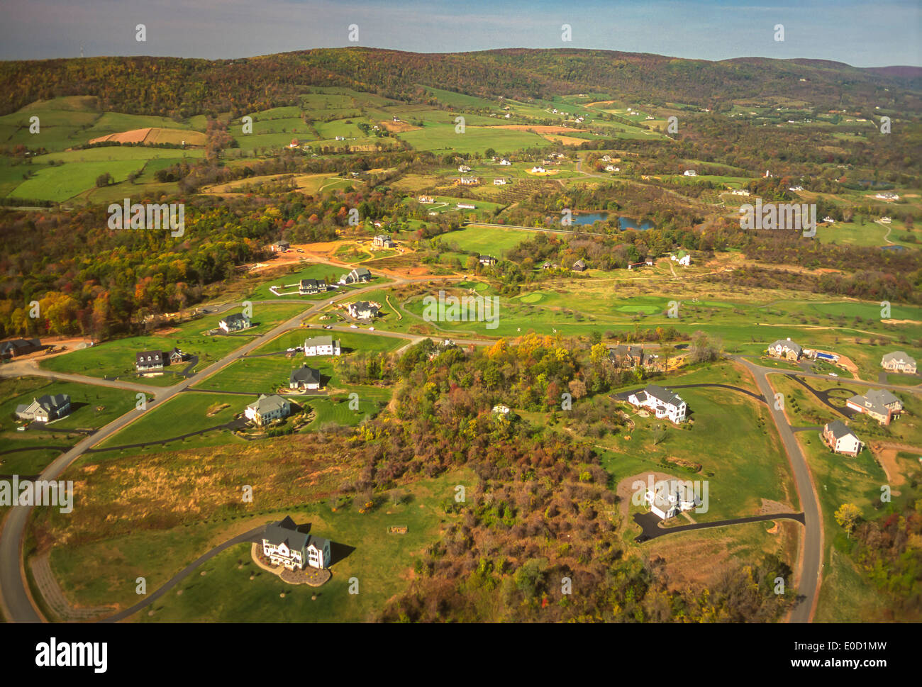 LOUDOUN COUNTY, VIRGINIA, USA - Aerial of homes and Blue Ridge Mountains. Stock Photo