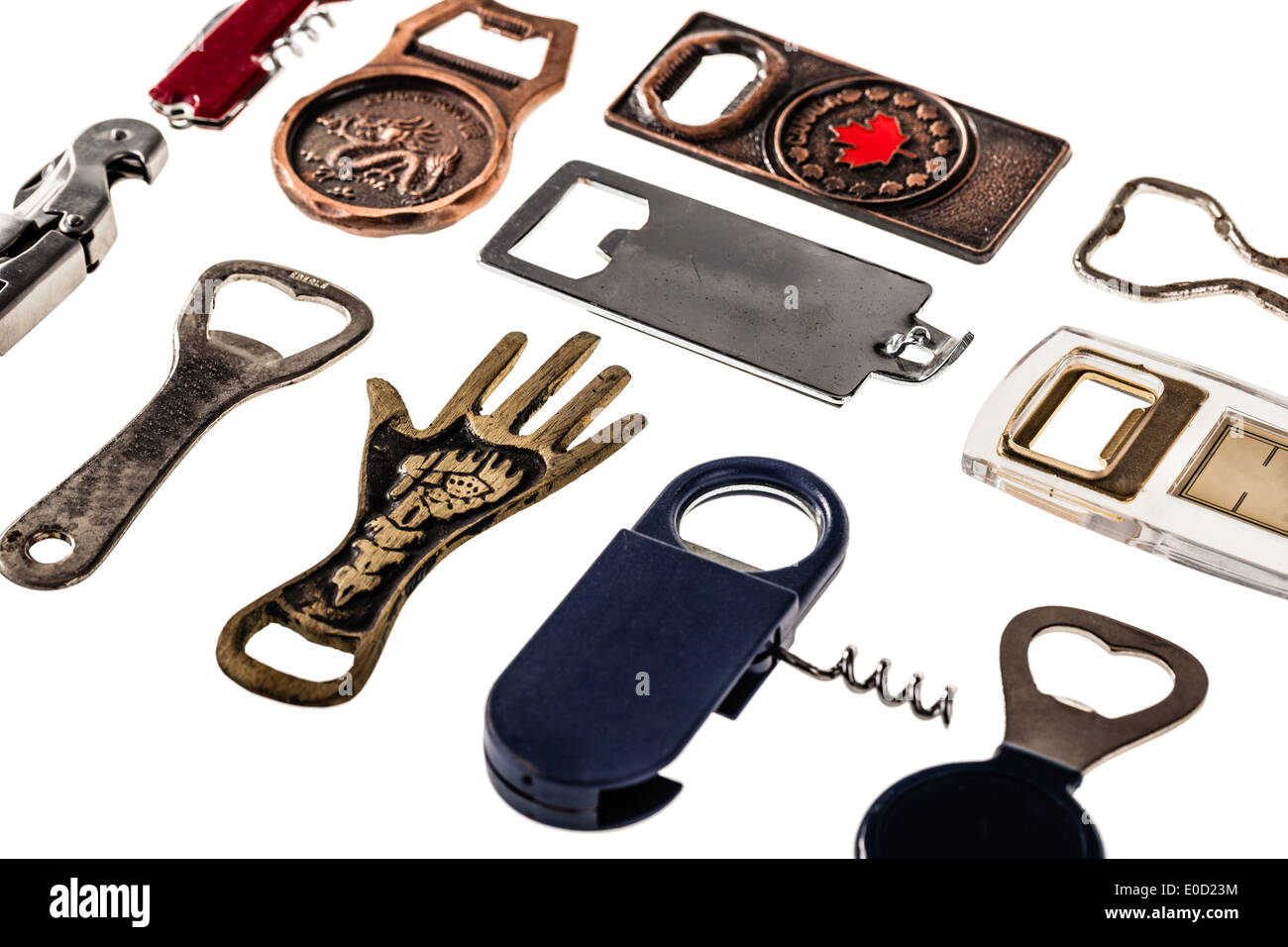 a collection of many different bottle openers isolated on a white background Stock Photo Alamy