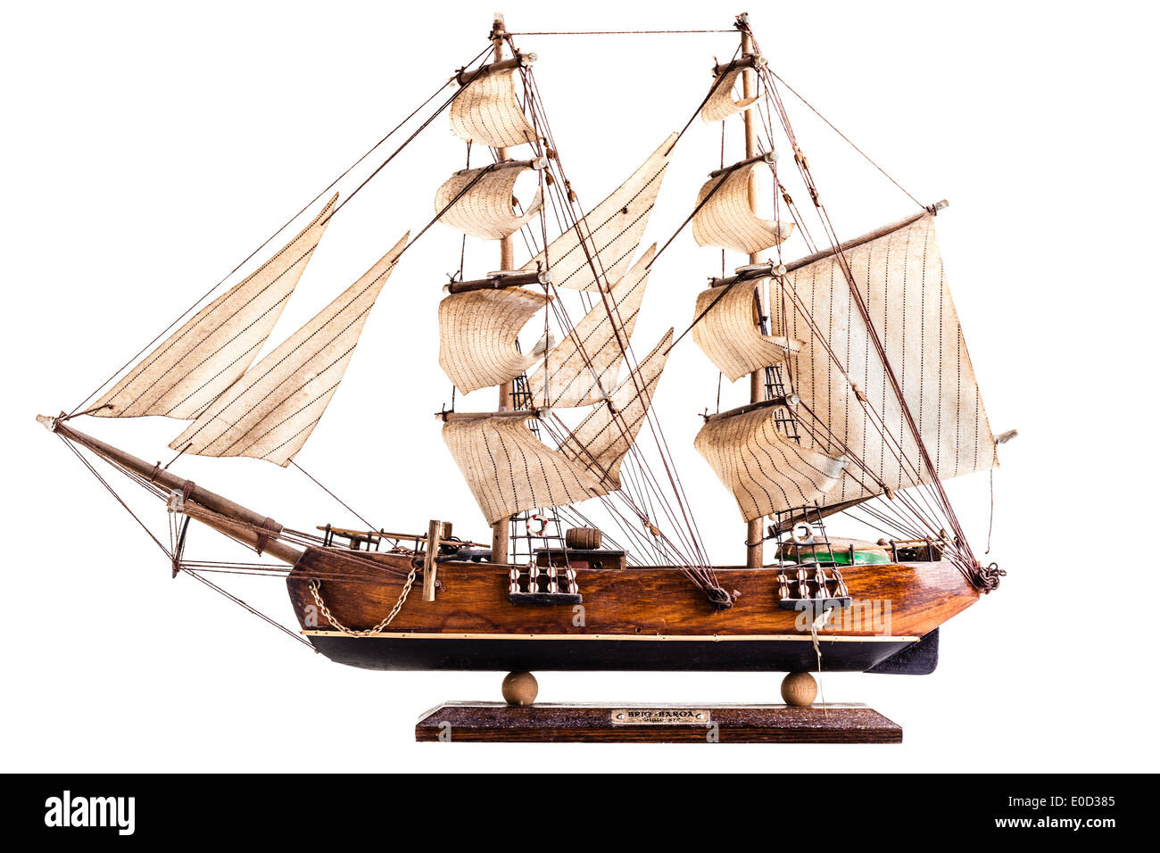 A barque is a sailing vessel with three masts having the foremasts rigged square and only the aftermast rigged fore-and-aft. Stock Photo