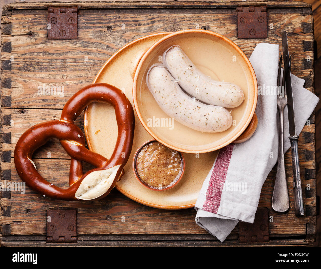Bavarian snack with weisswurst white sausages and pretzel Stock Photo
