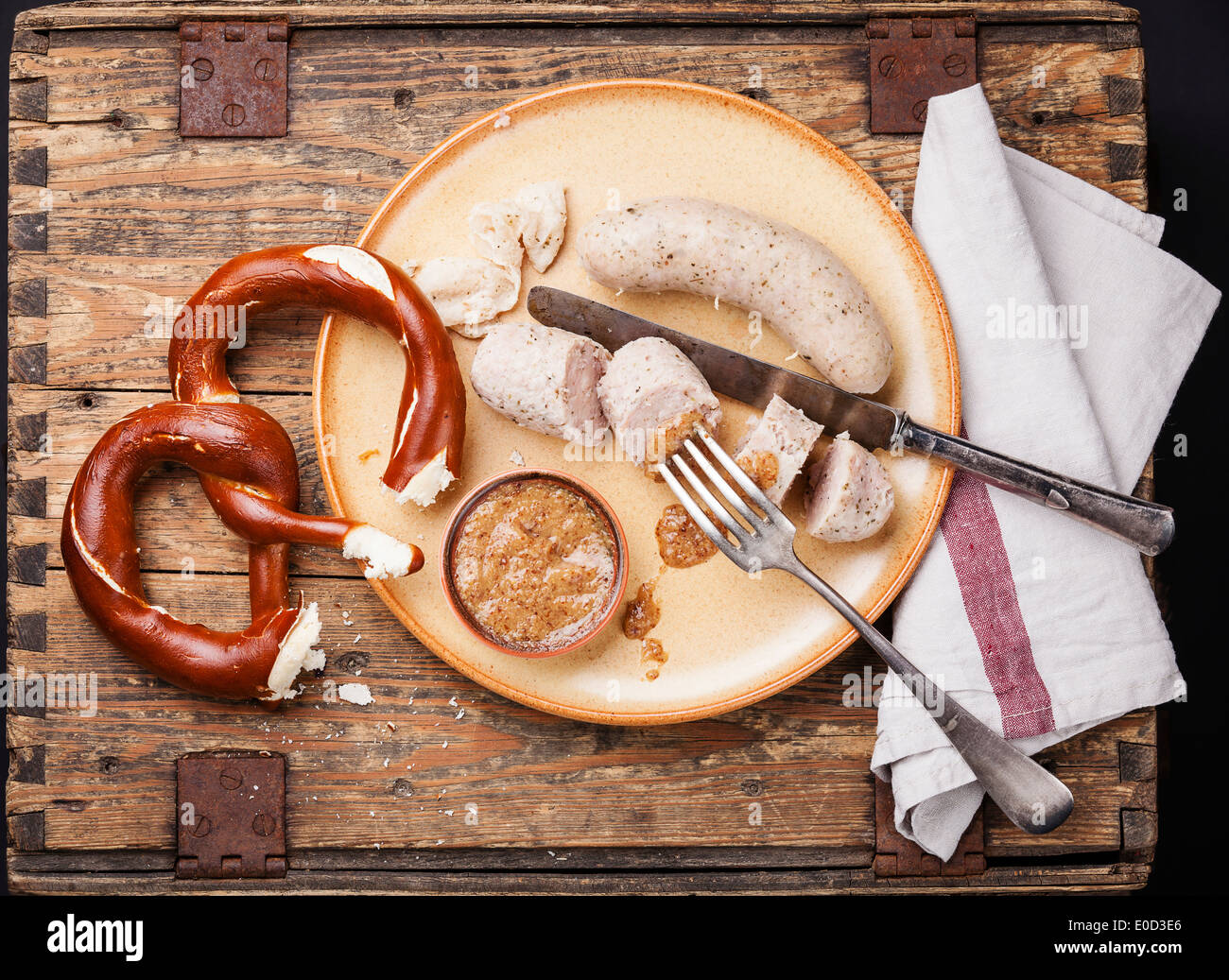 Bavarian snack with weisswurst white sausages and pretzel Stock Photo