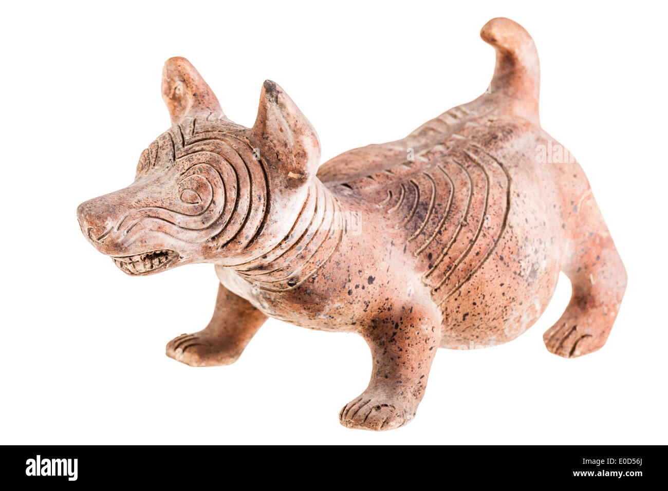clay aboriginal sculpture depicting a dingo. Isolated on white Stock Photo