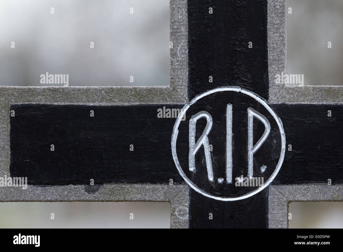 The letter RIP on an old marble grave in Holland Stock Photo