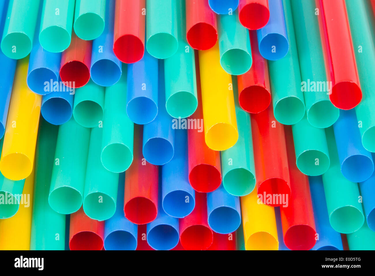 Different colors of straws (green  blue  yellow  red) Stock Photo