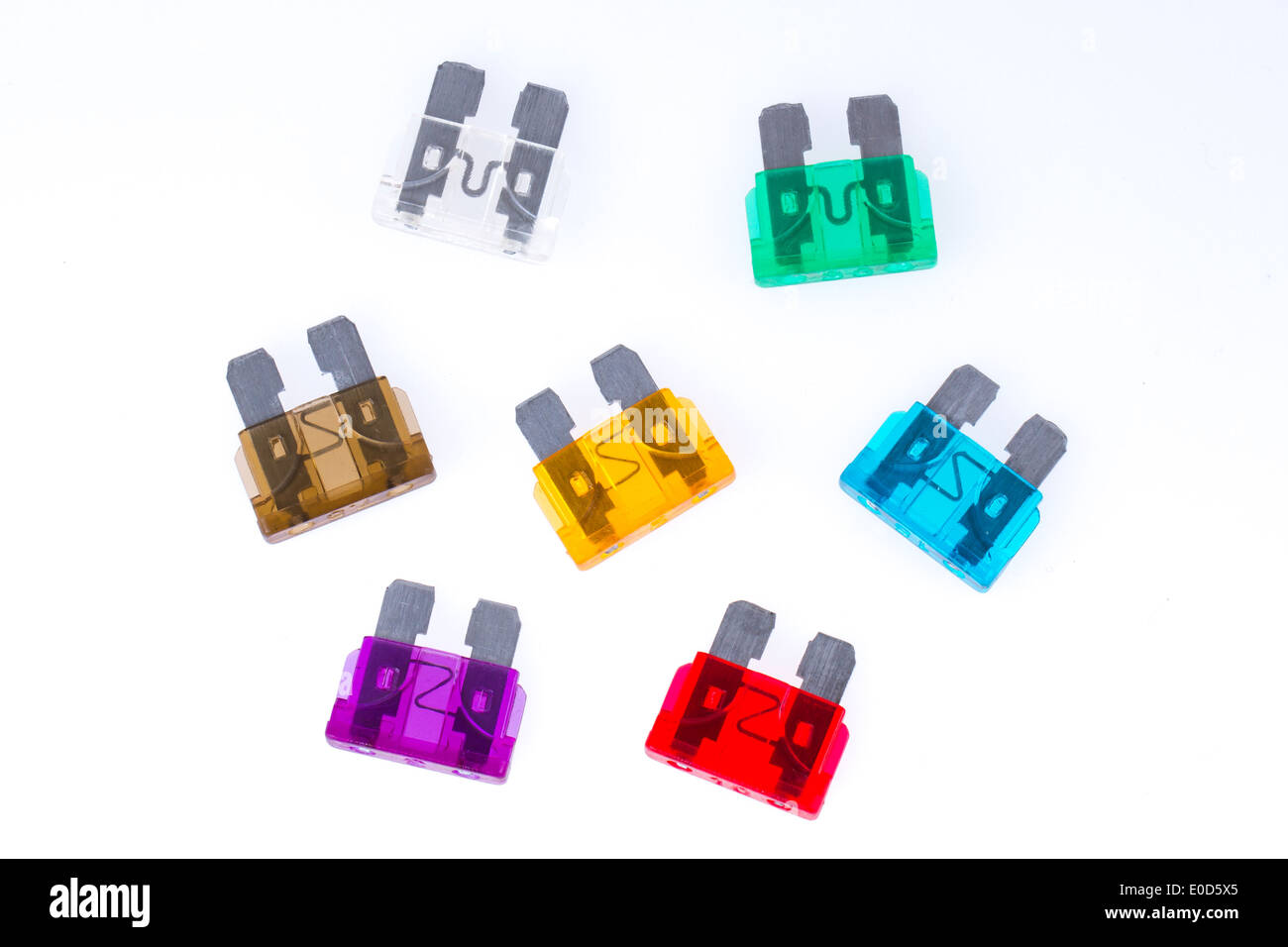 Different colors of car fuses with a white background Stock Photo Alamy