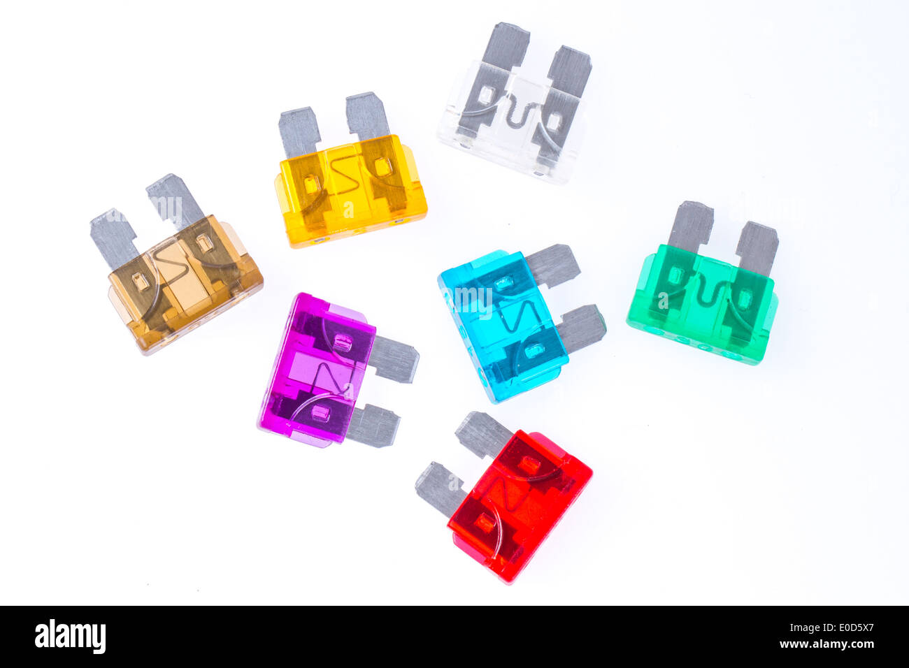 Different colors of car fuses with a white background Stock Photo Alamy