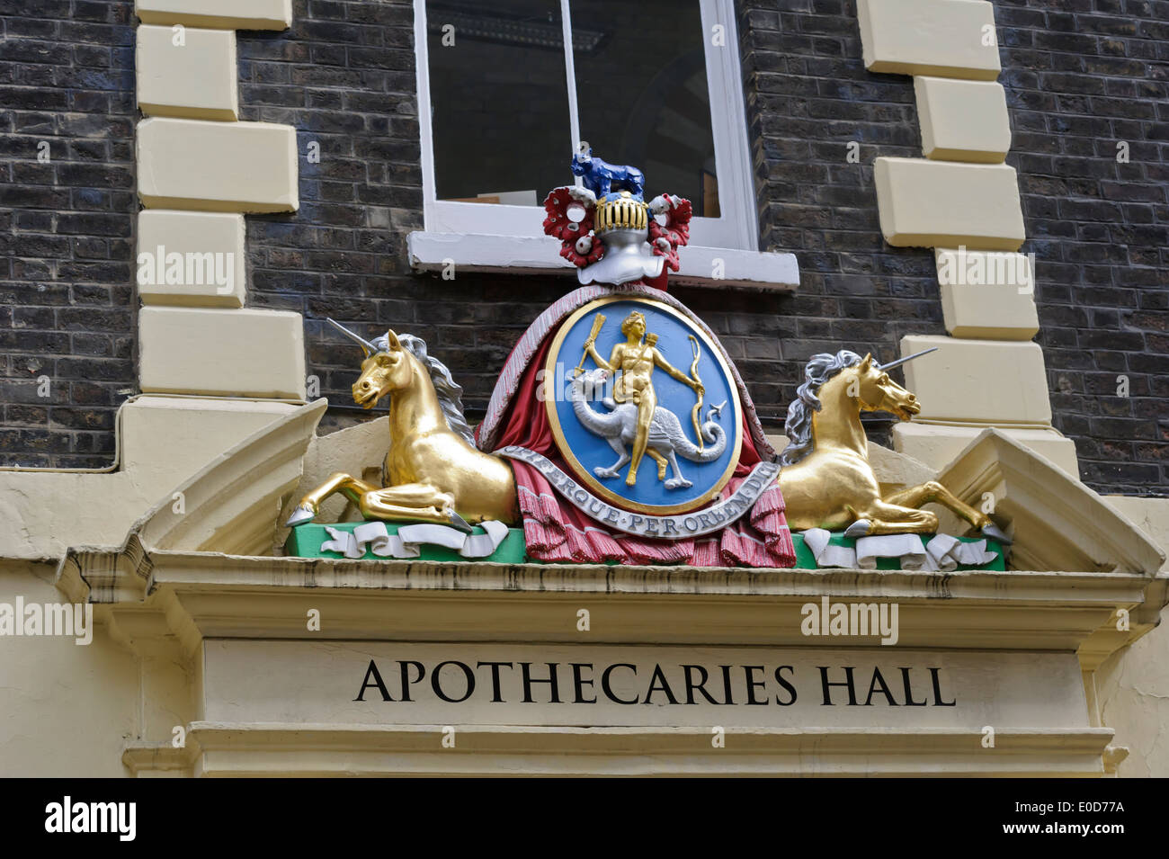 Unicorns and Code of Arms above the entrance of Apothecaries' Hall, London, England, United Kingdom. Stock Photo